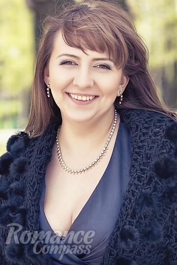 Ukrainian mail order bride Anna from Donetsk with light brown hair and brown eye color - image 1