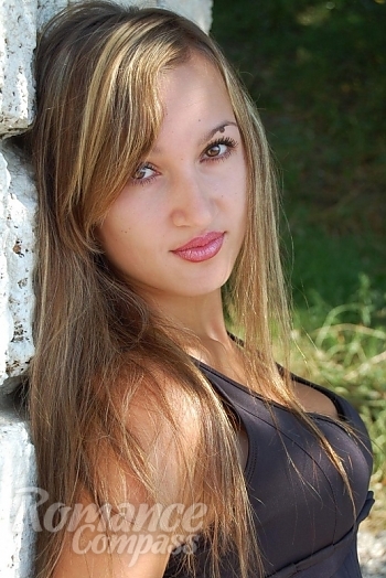 Ukrainian mail order bride Olga from Kherson with light brown hair and green eye color - image 1