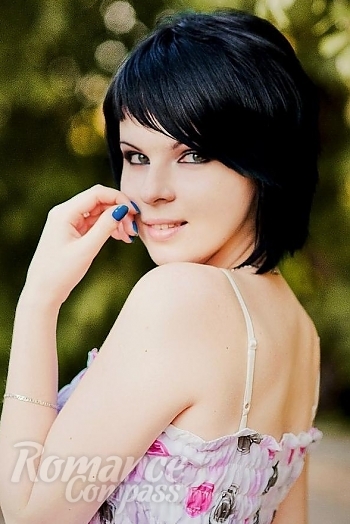 Ukrainian mail order bride Victoria from Poltava with black hair and green eye color - image 1
