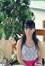 Ukrainian mail order bride Yana from Zaporozhye with black hair and green eye color - image 10