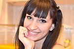 Ukrainian mail order bride Yana from Zaporozhye with black hair and green eye color - image 9