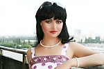 Ukrainian mail order bride Oxana from Kiev with black hair and green eye color - image 11