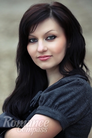 Ukrainian mail order bride Eugeniya from Kharkov with black hair and green eye color - image 1