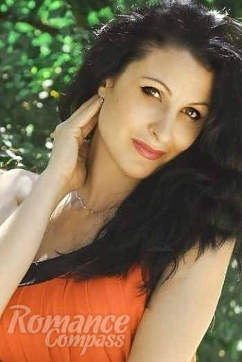 Ukrainian mail order bride Ekaterina from Nikolaev with black hair and green eye color - image 1