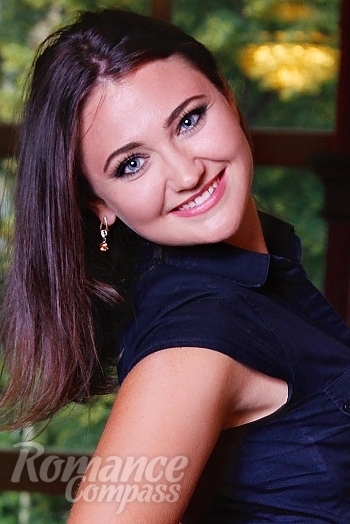 Ukrainian mail order bride Oksana from Kharkov with brunette hair and black eye color - image 1