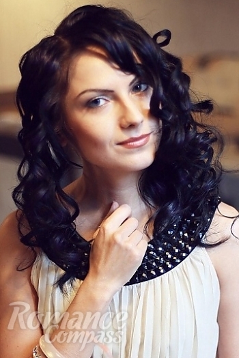 Ukrainian mail order bride Elena from Donetsk with black hair and blue eye color - image 1