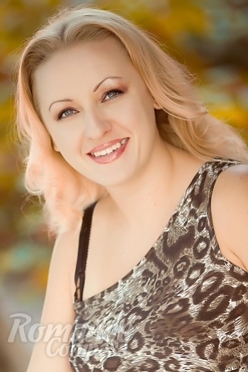 Ukrainian mail order bride Alena from Nikolaev with blonde hair and blue eye color - image 1