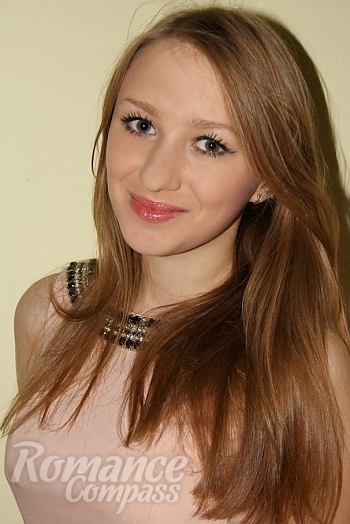 Ukrainian mail order bride Julia from Cherkassy with light brown hair and green eye color - image 1