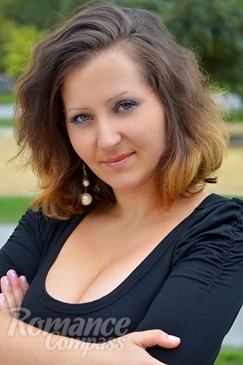Ukrainian mail order bride Elena from Nikolaev with light brown hair and green eye color - image 1