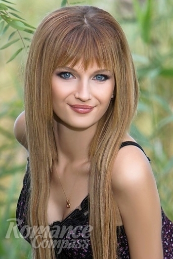 Ukrainian mail order bride Maria from Odessa with light brown hair and blue eye color - image 1
