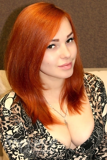 Ukrainian mail order bride Anastasia from Kherson with red hair and hazel eye color - image 1