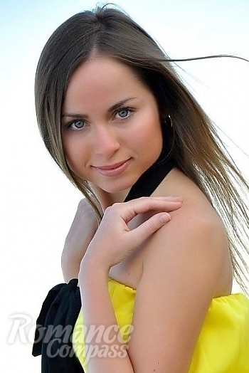 Ukrainian mail order bride Olga from Chuguev with black hair and blue eye color - image 1