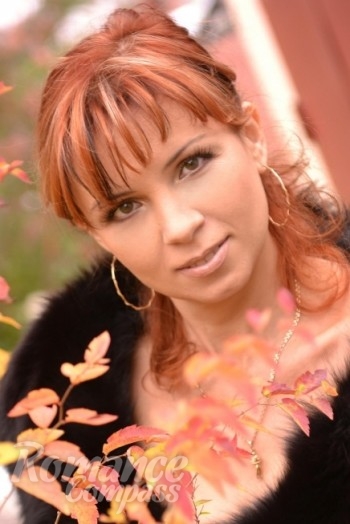 Ukrainian mail order bride Olena from Mariupol with light brown hair and brown eye color - image 1
