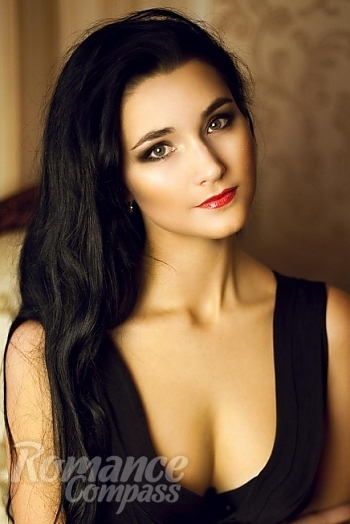 Ukrainian mail order bride Natalya from Donetsk with black hair and green eye color - image 1