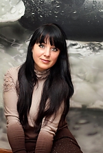Ukrainian mail order bride Larisa from Gulyaipole with black hair and green eye color - image 5