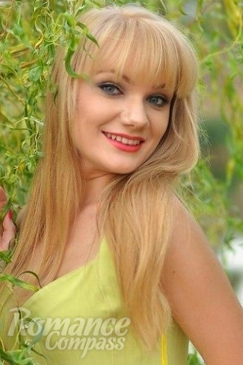 Ukrainian mail order bride Katya from Shatsk with blonde hair and blue eye color - image 1