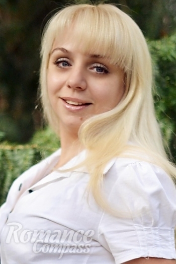 Ukrainian mail order bride Anna from Yalta with blonde hair and blue eye color - image 1
