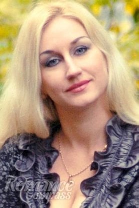 Ukrainian mail order bride Tatyana from Nikolaev with blonde hair and blue eye color - image 1
