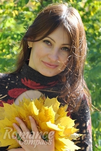 Ukrainian mail order bride Viktoriya from Nikolaev with brunette hair and green eye color - image 1