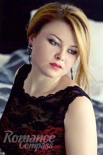 Ukrainian mail order bride Olga from Odessa with brunette hair and brown eye color - image 1