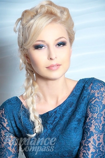 Ukrainian mail order bride Svetlana from Kherson with blonde hair and green eye color - image 1