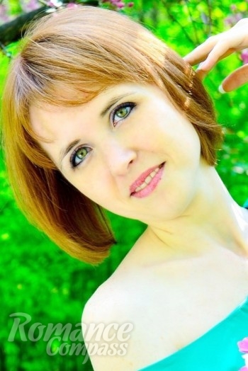 Ukrainian mail order bride Katya from Cherkassy with light brown hair and green eye color - image 1
