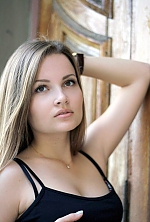 Ukrainian mail order bride Arina from Nikolaev with light brown hair and hazel eye color - image 3
