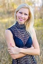 Ukrainian mail order bride Anna from Kherson with blonde hair and blue eye color - image 5