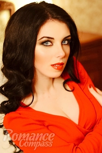 Ukrainian mail order bride Darina from Donetsk with black hair and blue eye color - image 1