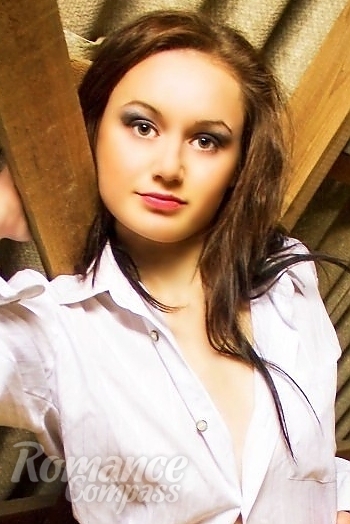 Ukrainian mail order bride Irina from Olgino with brunette hair and green eye color - image 1