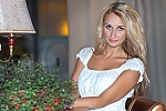 Ukrainian mail order bride Anna from Nikolaev with blonde hair and blue eye color - image 2