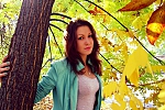 Ukrainian mail order bride Nadezhda from Nikolaev with brunette hair and green eye color - image 3