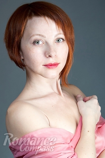 Ukrainian mail order bride Elena from Mariupol with red hair and green eye color - image 1