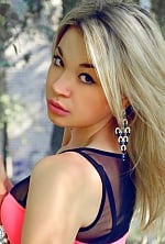 Ukrainian girl Marina,33 years old with brown eyes and blonde hair.