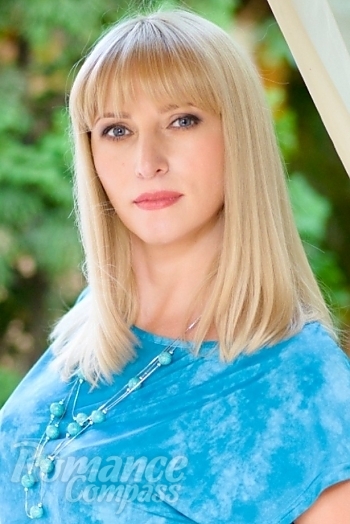 Ukrainian mail order bride Maria from Nikolaev with blonde hair and blue eye color - image 1