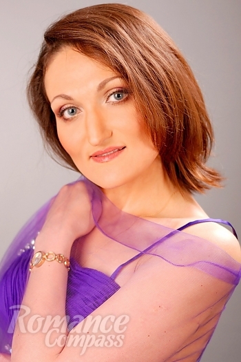 Ukrainian mail order bride NAtalya from Kiev with brunette hair and blue eye color - image 1