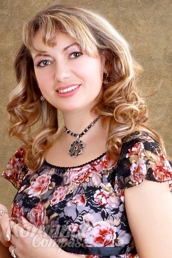 Ukrainian mail order bride Ludmila from Feodosia with light brown hair and hazel eye color - image 1