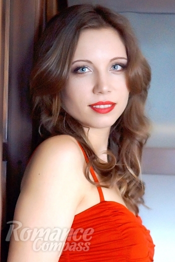 Ukrainian mail order bride Nataliya from Nikolaev with light brown hair and blue eye color - image 1