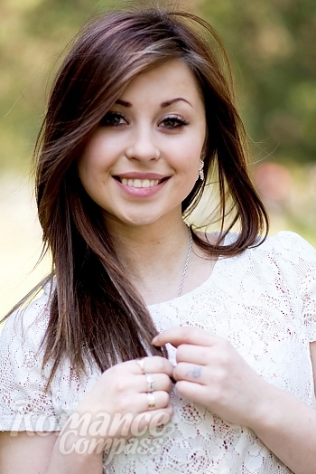 Ukrainian mail order bride Yana from Dnipro with light brown hair and green eye color - image 1
