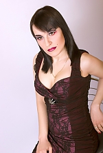 Ukrainian mail order bride Oksana from Nikolaev with black hair and hazel eye color - image 2