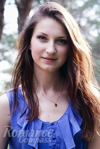 Ukrainian mail order bride Anna from Mykolayiv with light brown hair and blue eye color - image 1