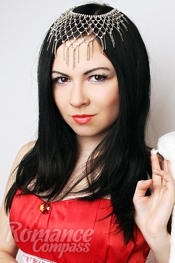 Ukrainian mail order bride Tatyana from Nikolaev with black hair and hazel eye color - image 1