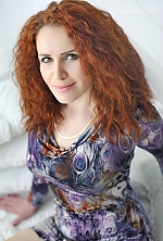 Ukrainian mail order bride Elena from Nikolaev with red hair and green eye color - image 3