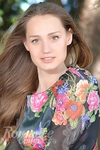 Ukrainian mail order bride Kseniya from Nikolaev with light brown hair and green eye color - image 1