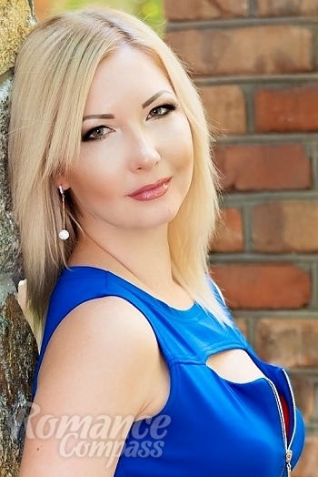 Ukrainian mail order bride Kristina from Nikolaev with blonde hair and green eye color - image 1