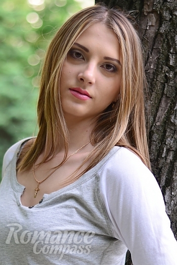 Ukrainian mail order bride Olga from Donetsk with light brown hair and brown eye color - image 1
