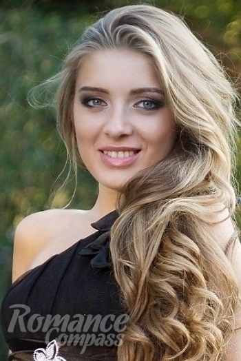 Ukrainian mail order bride Ekaterina from Kharkiv with light brown hair and blue eye color - image 1