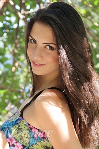 Ukrainian mail order bride Yulya from Zaporozhye with black hair and green eye color - image 1