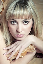 Ukrainian mail order bride Olena from Chornomorsk with blonde hair and black eye color - image 2