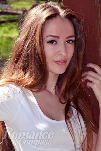 Ukrainian mail order bride Natalia from Nikopol with light brown hair and brown eye color - image 1